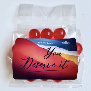 Translucent red bath oil beads 25 pack front package
